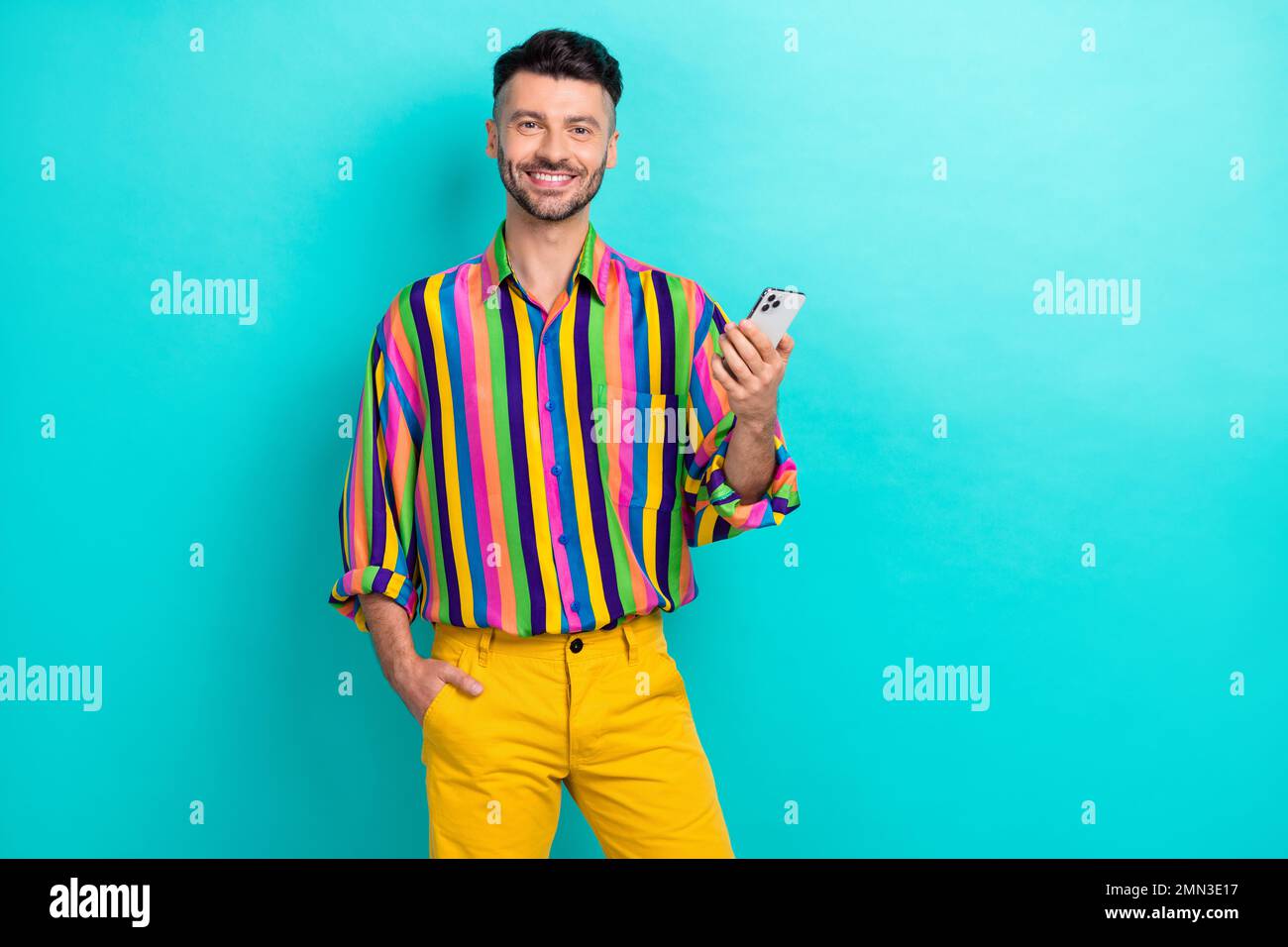 Portrait of optimistic positive handsome guy with brunet haircut wear ...