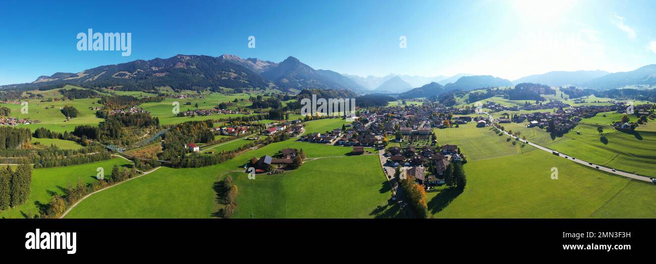 Aerial View Of Fischen Im Allgäu With View Of St. Verena Parish Church. Fischen Im Allgäu, Oberallgäu, Swabia, Bavaria, Germany. Stock Photo