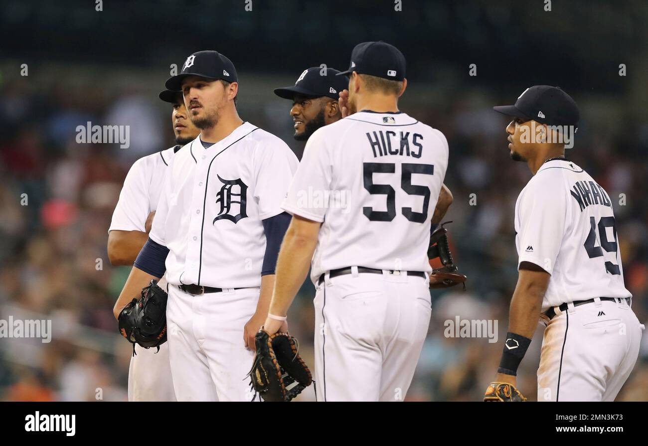 Detroit Tigers starting pitcher Blaine Hardy, left, stands on the mound  before being relieved during the fifth inning of the team's baseball game  against the Oakland Athletics, Tuesday, June 26, 2018, in