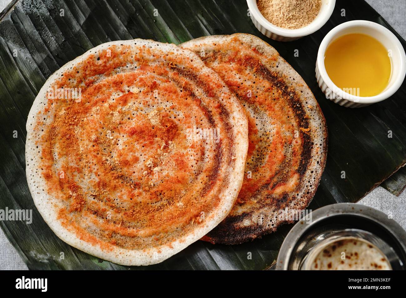 South Indian vegetarian breakfast idli karam podi dosa sambar chutney  powder ghee and filter coffee Stock Photo - Alamy