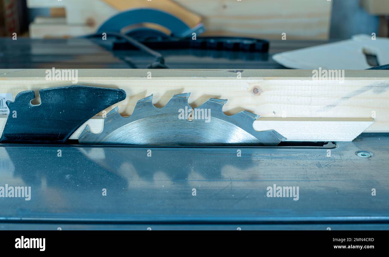 Circular saw. Metal toothed disc. Joiners tool for cutting wood. Close