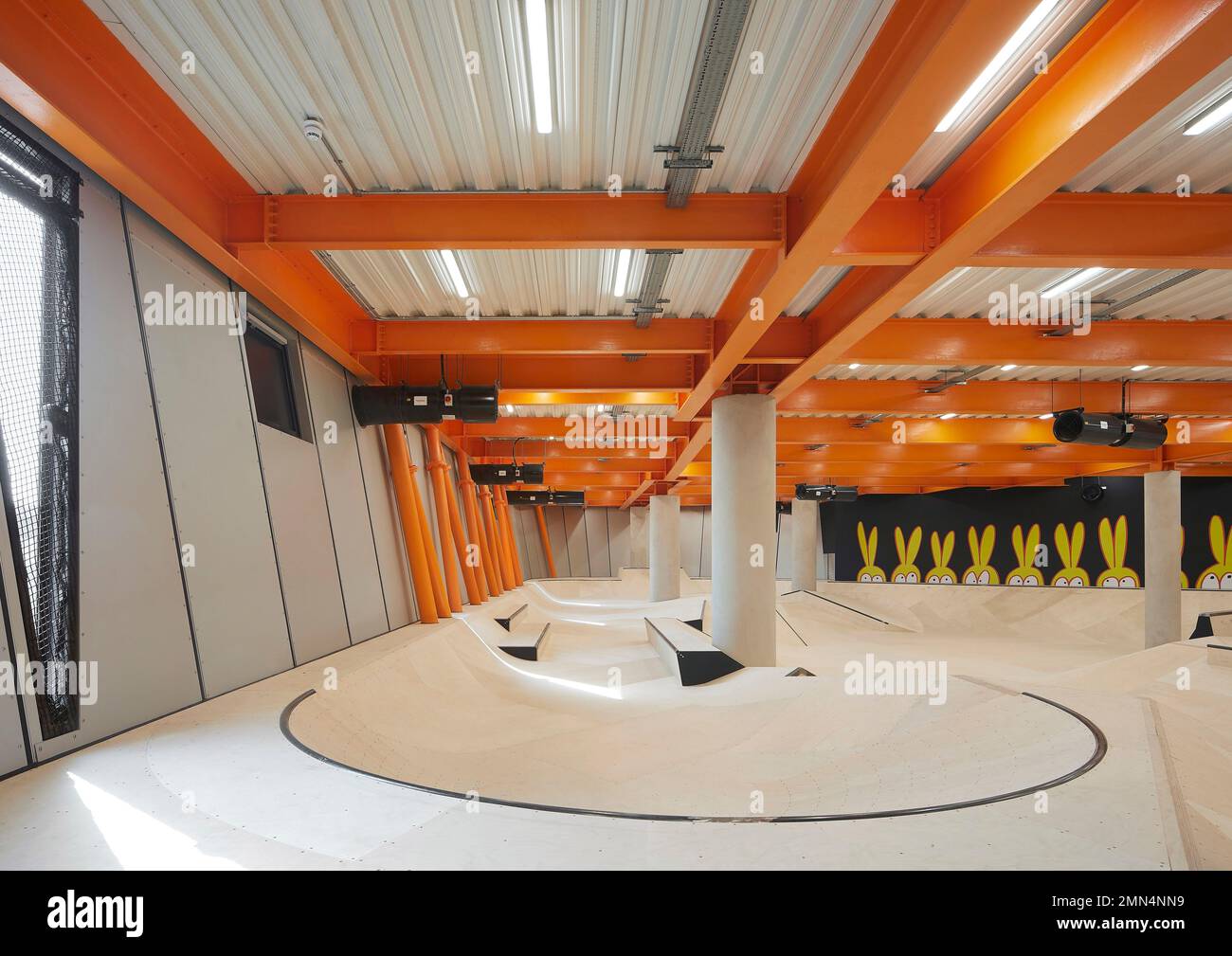 Inside of concrete skate bowl. F51 Skatepark, Folkestone, United Kingdom. Architect: Hollaway Studio, 2022. Stock Photo
