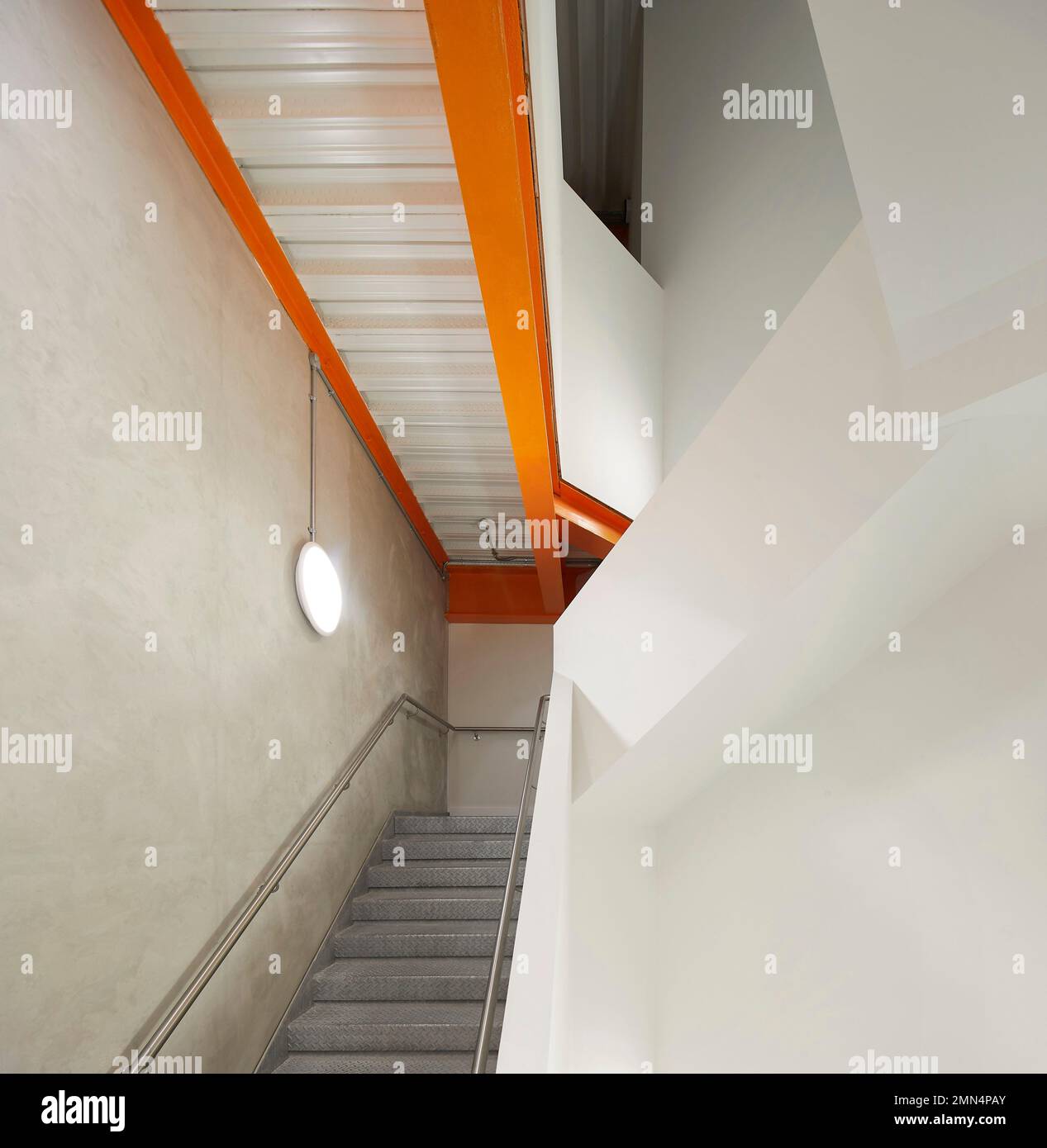 Concrete stairway from below. F51 Skatepark, Folkestone, United Kingdom. Architect: Hollaway Studio, 2022. Stock Photo