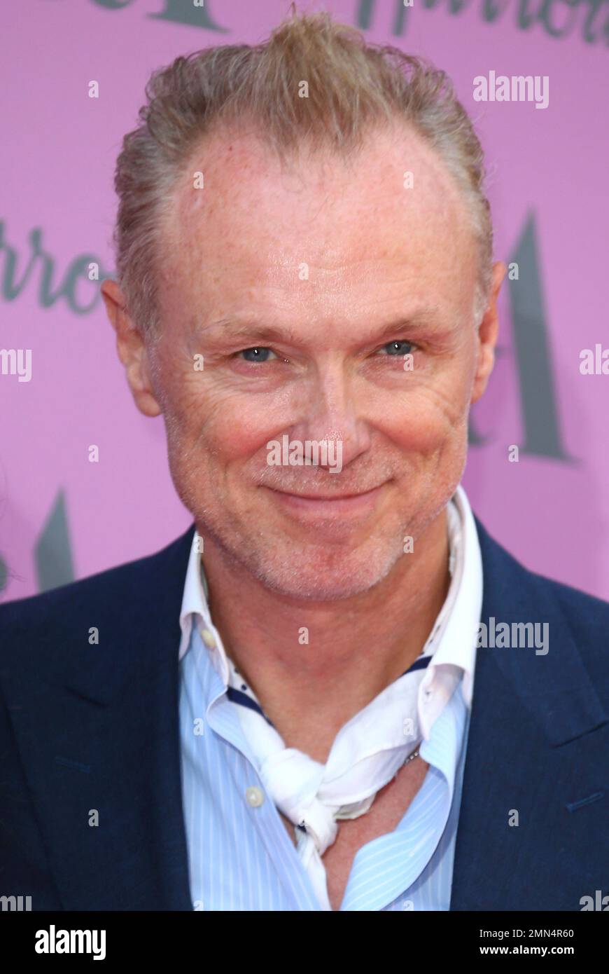 Gary Kemp poses for photographers upon arrival at the V & A Summer