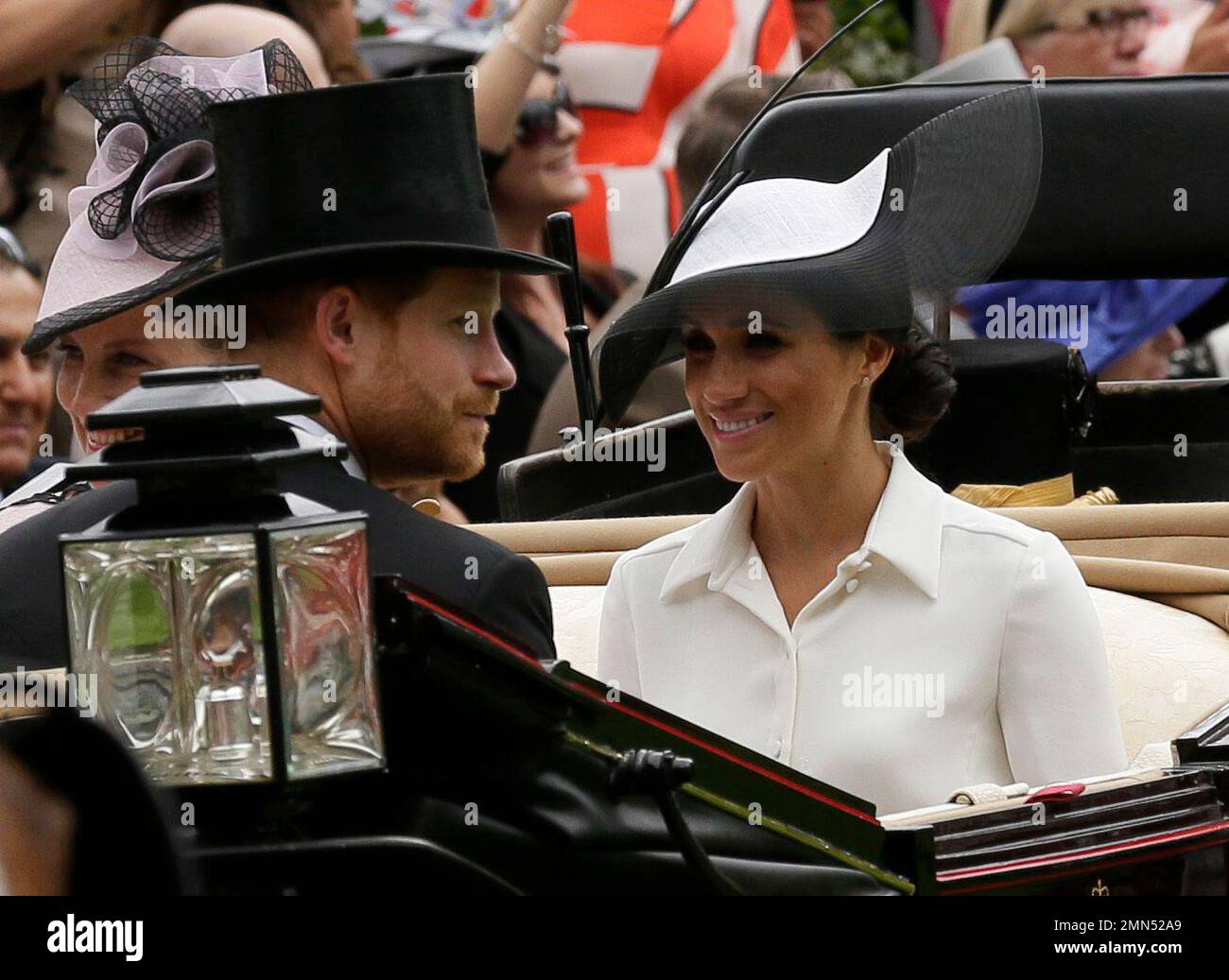 Britain's Prince Harry and Meghan, Duchess of Sussex, arrives at the(02)