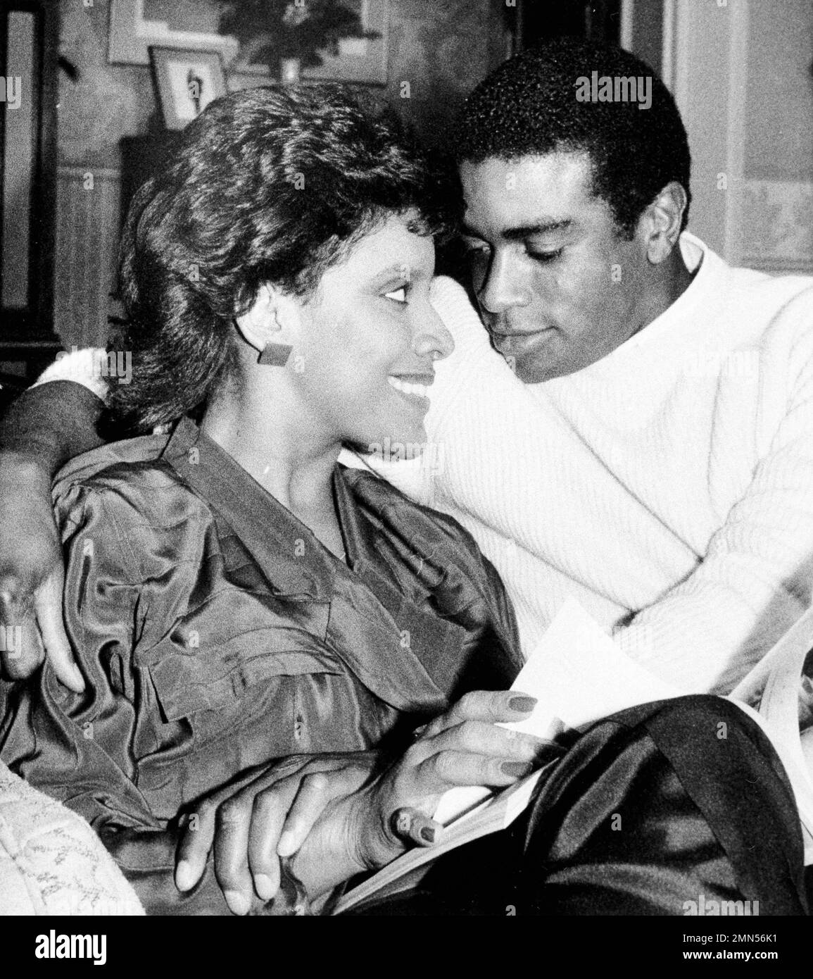 Ahmad Rashad Pro-football star Ahmad Rashad sits with his girlfriend Phylicia Ayers ...