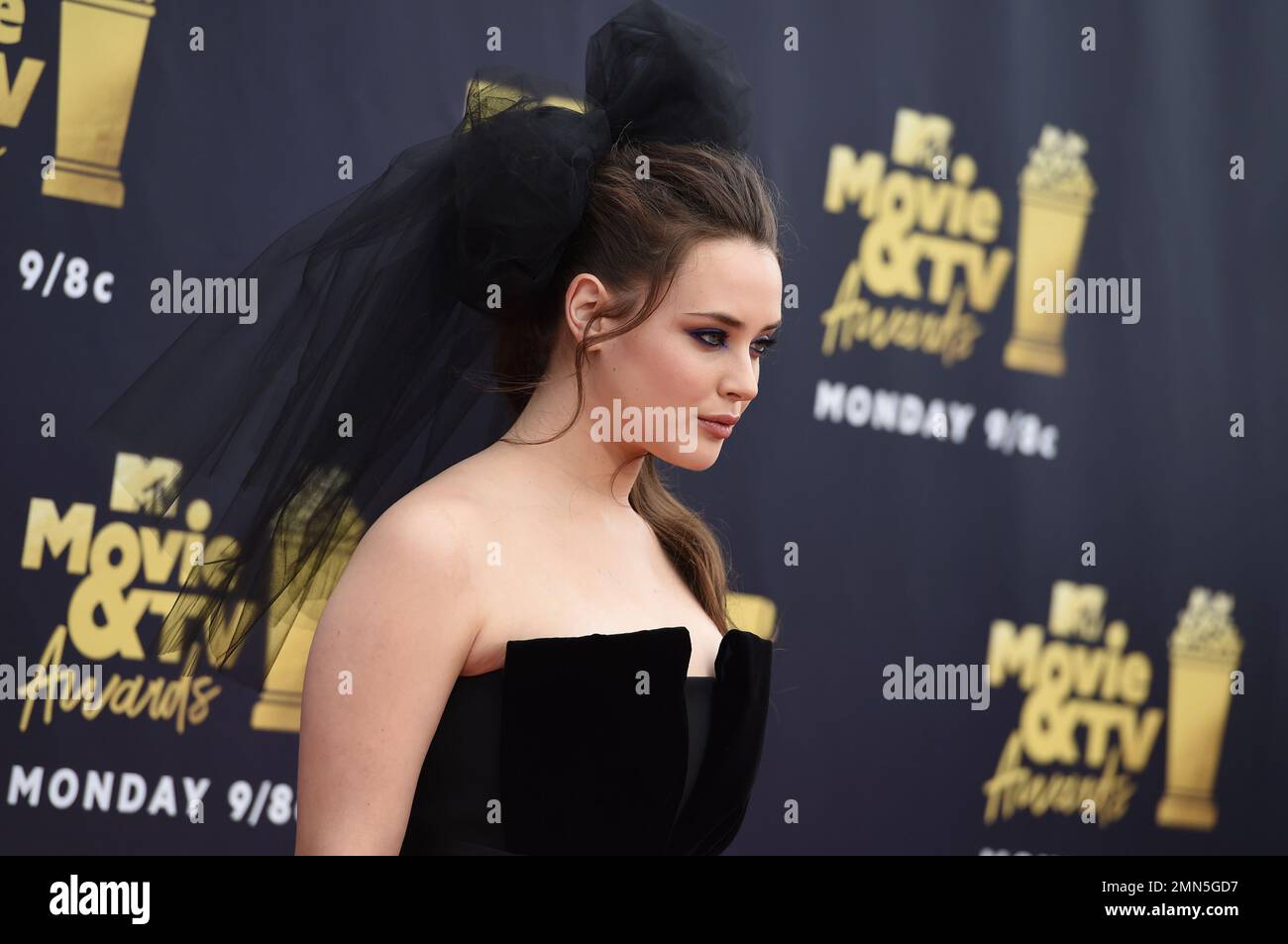 Katherine Langford arrives at the MTV Movie and TV Awards at the Barker