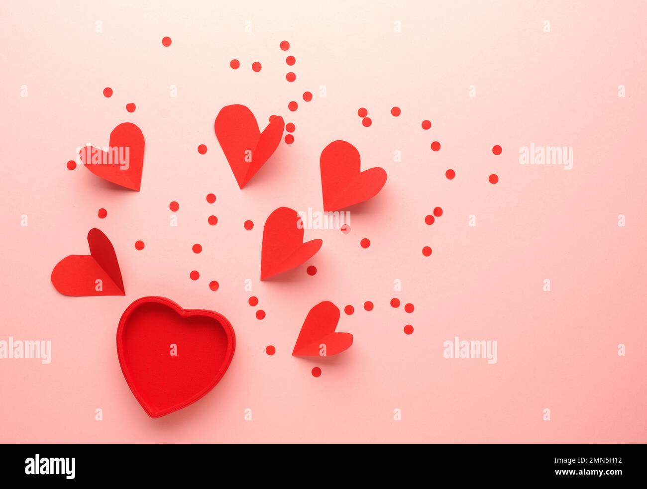 Red heart shapes on a pink background, Wedding or Valentines Day ...