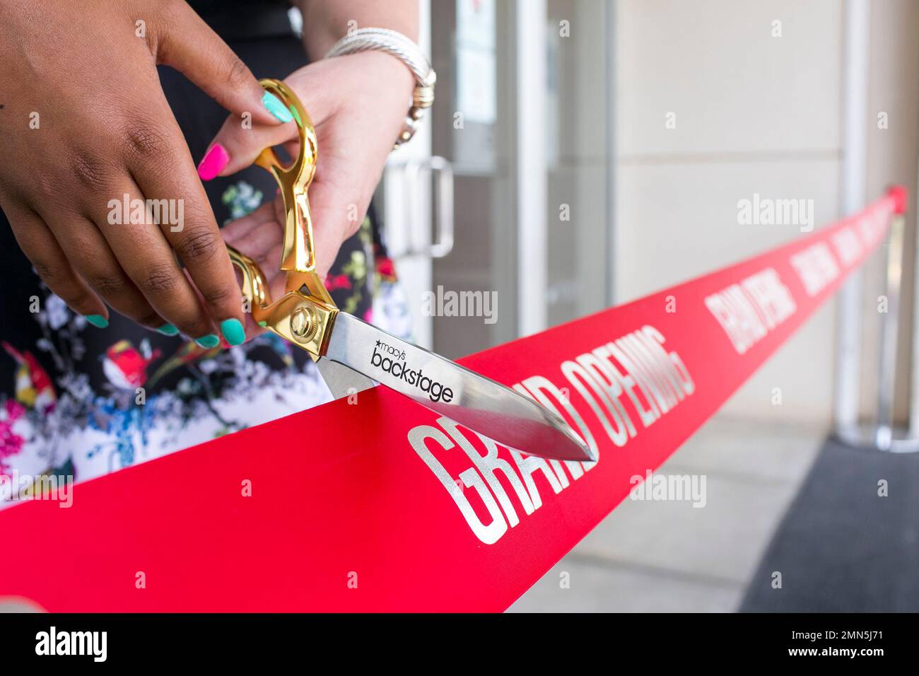 IMAGE DISTRIBUTED FOR MACY'S The ribbon cutting at the Grand Opening