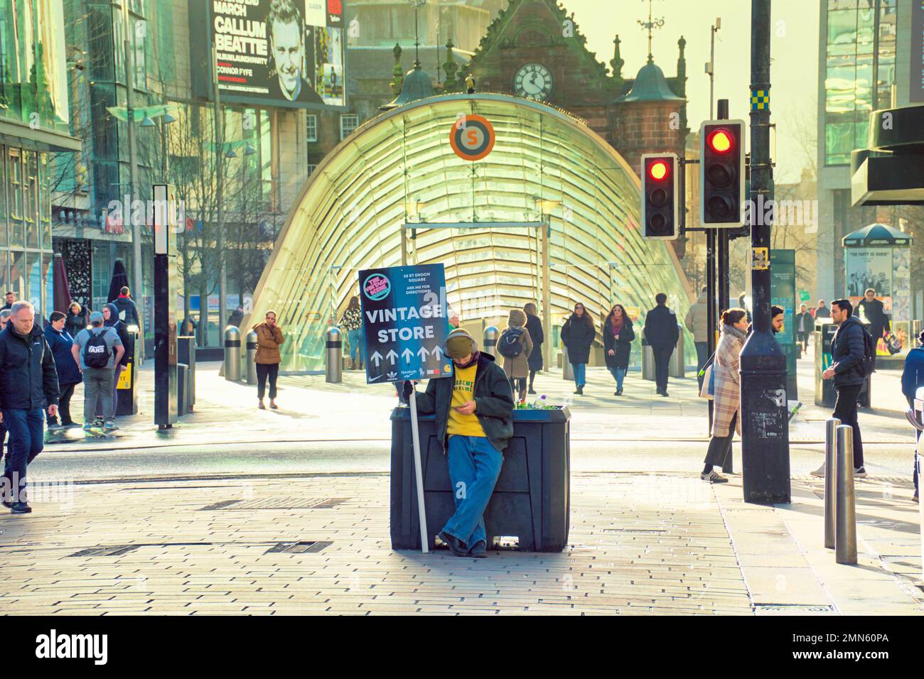 Glasgow, Scotland, UK 29tht January, 2023. UK Weather: sr Enoch subway Vintage store gig wage sandwich board minimum wage  placard holder   Cold and wet saw sunny style mile on the shopping. Capital of Scotland that is Buchanan street. Credit Gerard Ferry/Alamy Live News Stock Photo