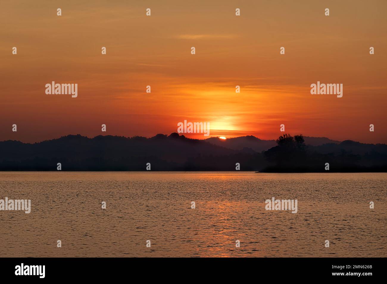 Sunset on Khao Laem Lake (Vajiralongkorn Dam), Khao Laem National Park, Kanchanaburi, Thailand Stock Photo
