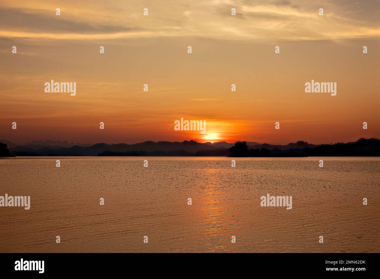 Sunset on Khao Laem Lake (Vajiralongkorn Dam), Khao Laem National Park, Kanchanaburi, Thailand Stock Photo