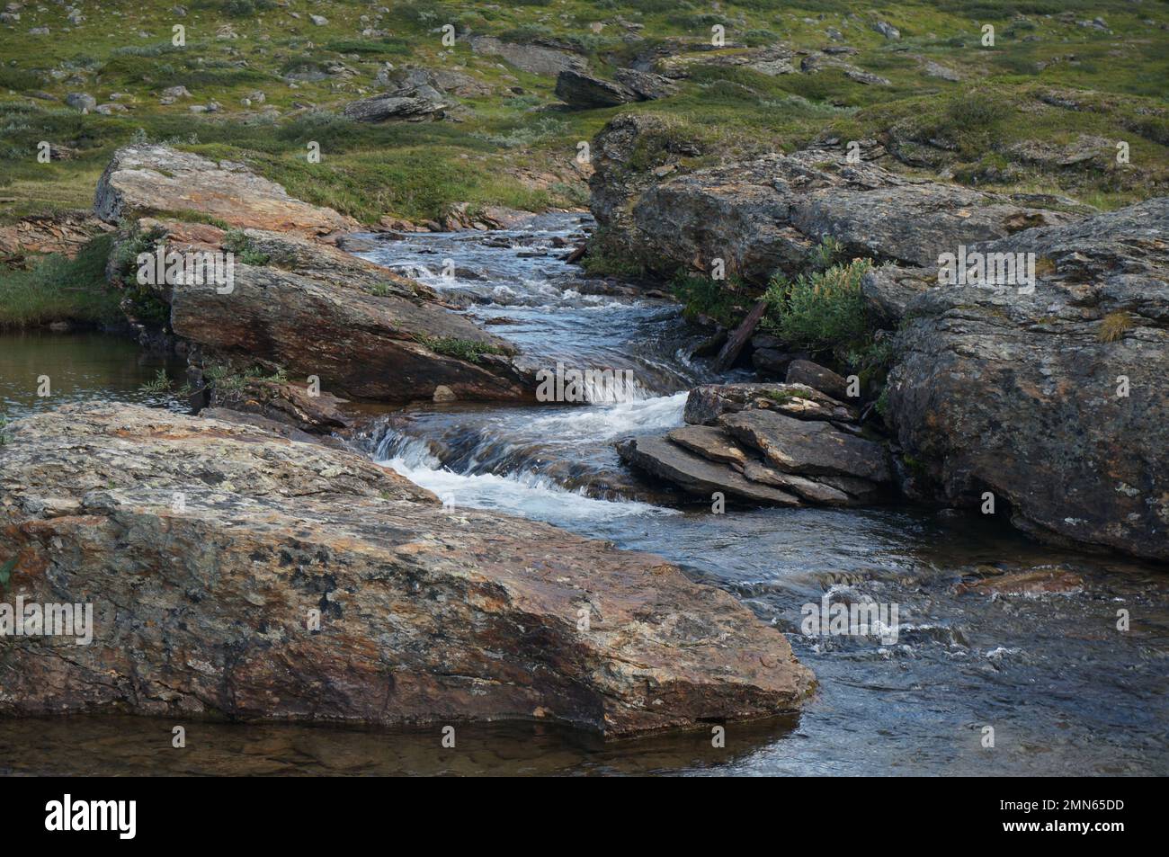 Stream among rocks in Swedish mountains Stock Photo
