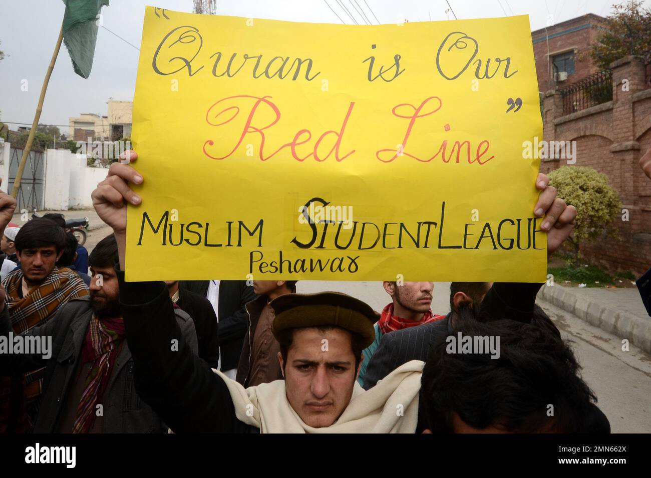 Peshawar, Pakistan. 29th Jan, 2023. Supporters of Muslim Man's League party hold a placard reading in Urdu 'Burning of the Koran is the worst type of terrorism by Sweden' during a protest against Sweden in Peshawar, Pakistan on Jan. 29, 2023. Pakistani Prime Minister Shahbaz Sharif, several Arab countries as well as Turkey condemned on 23 January, Islamophobia after Swedish-Danish far-right politician Rasmus Paludan burned a copy of the Koran at a rally in Stockholm on 21 January. (Photo by Hussain Ali/Pacific Press/Sipa USA) Credit: Sipa USA/Alamy Live News Stock Photo