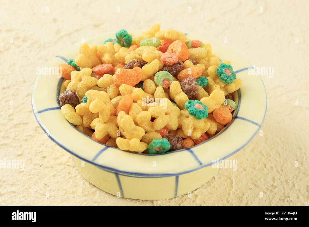 Colorful Star and Fruit Loops Cereal in A Bowl, Close Up Stock Photo