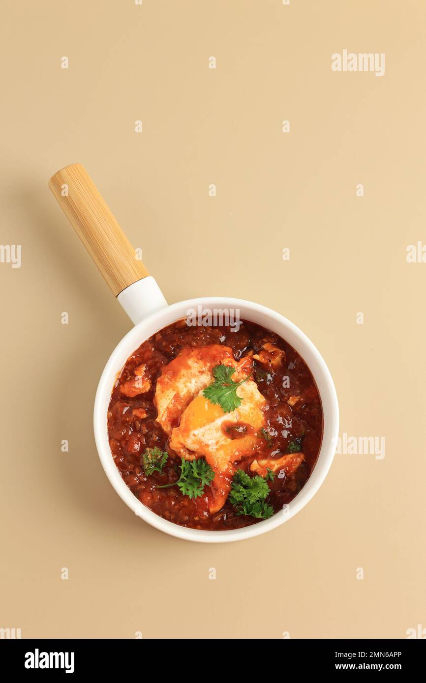 Shakshouka, Eggs Poached in Tomato Sauce, Olive Oil, Peppers, Onion