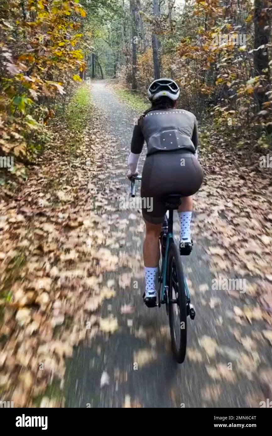 Cyclist rides on bike woman hi-res stock photography and images - Alamy