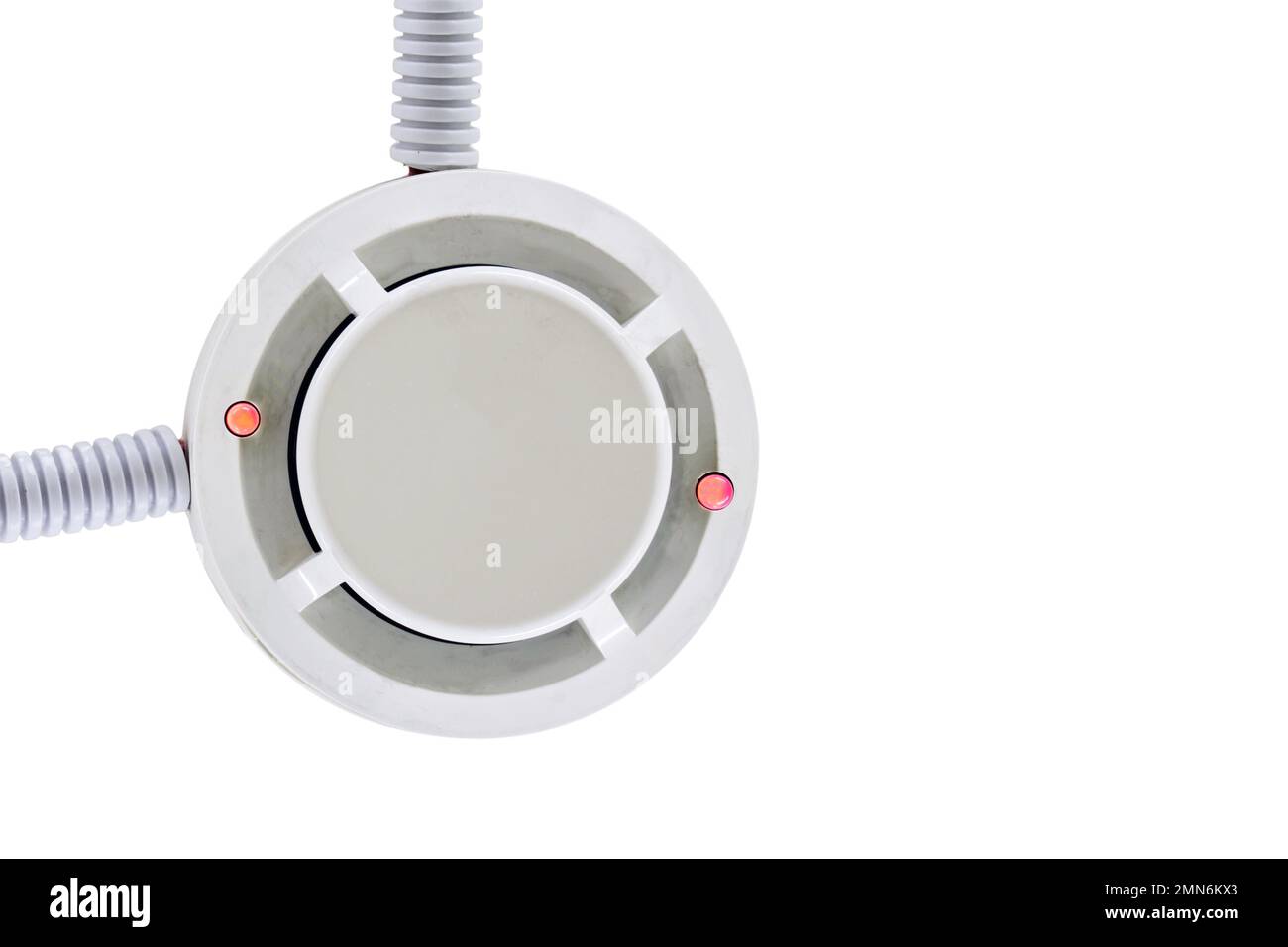 Flashing red lights fire alarm system on the ceiling in the room