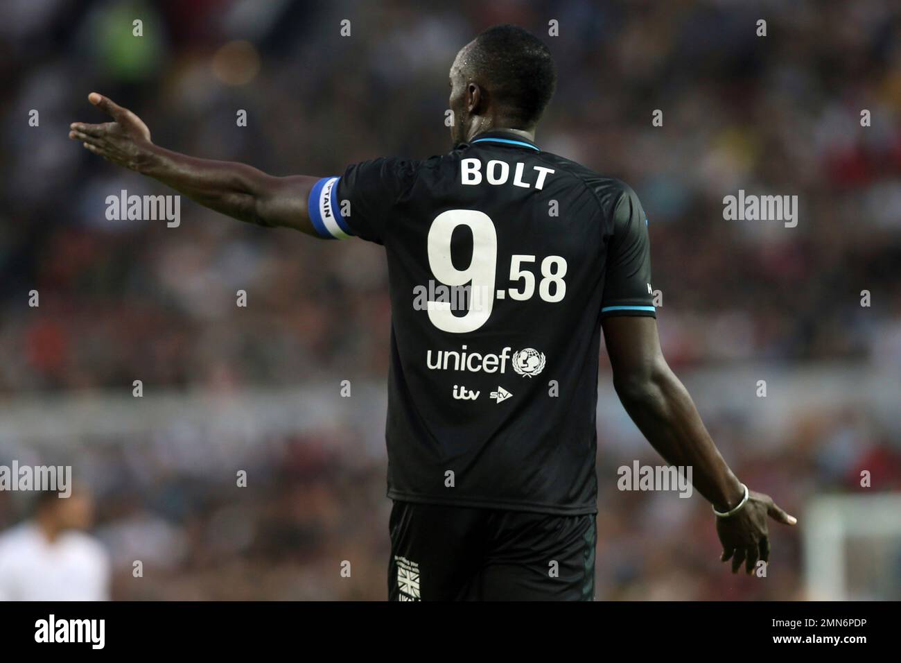 Former olympic and jamaican sprinter usain bolt wearing a shirt to
