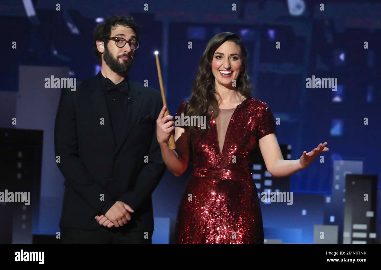 Cohosts Josh Groban, left, and Sara Bareilles appear on stage at the