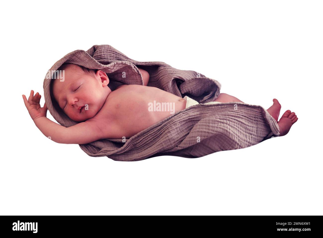 A newborn baby sleeps in a crib with a cocoon and a blanket in the form
