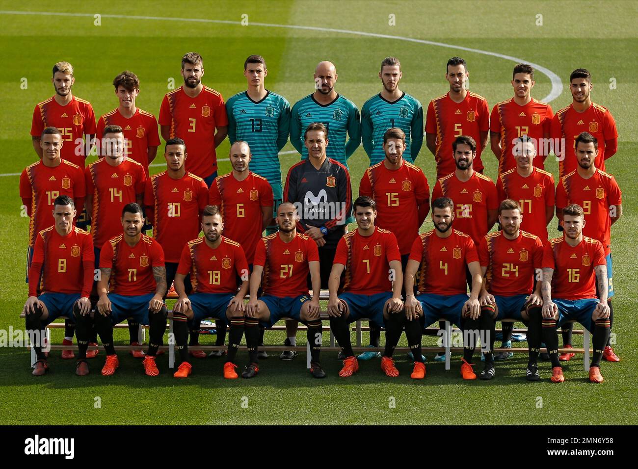 Spain's players wearing their new soccer kit for the 2018 World Cup pose  for a family photo before a training session in Las Rozas, outskirts  Madrid, Spain, Wednesday, Nov. 8, 2017. Spain