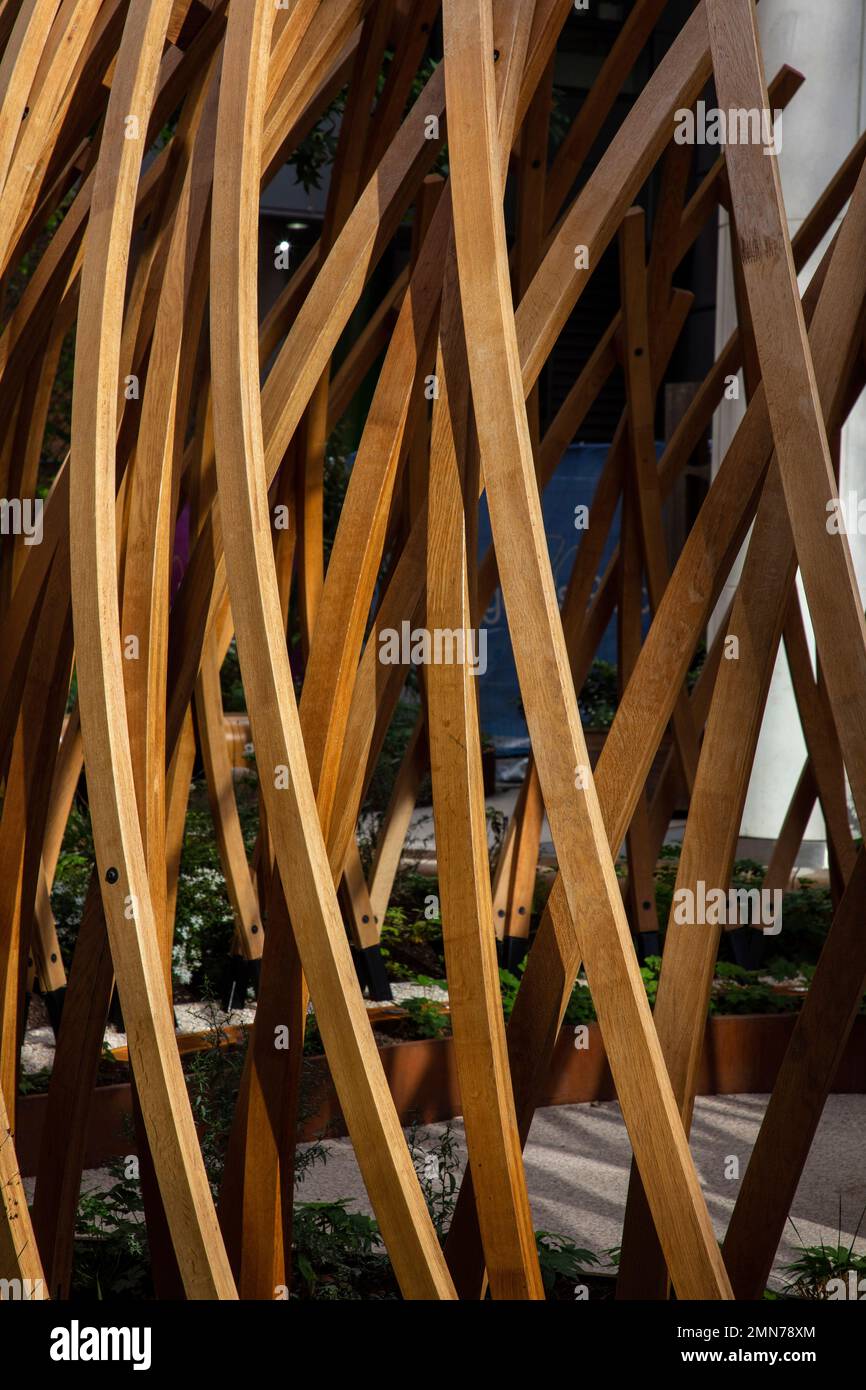 Looking through the wooden structure. Osnaburgh Pavilion at Regents Place, London, United Kingdom. Architect: NEX, 2022. Stock Photo