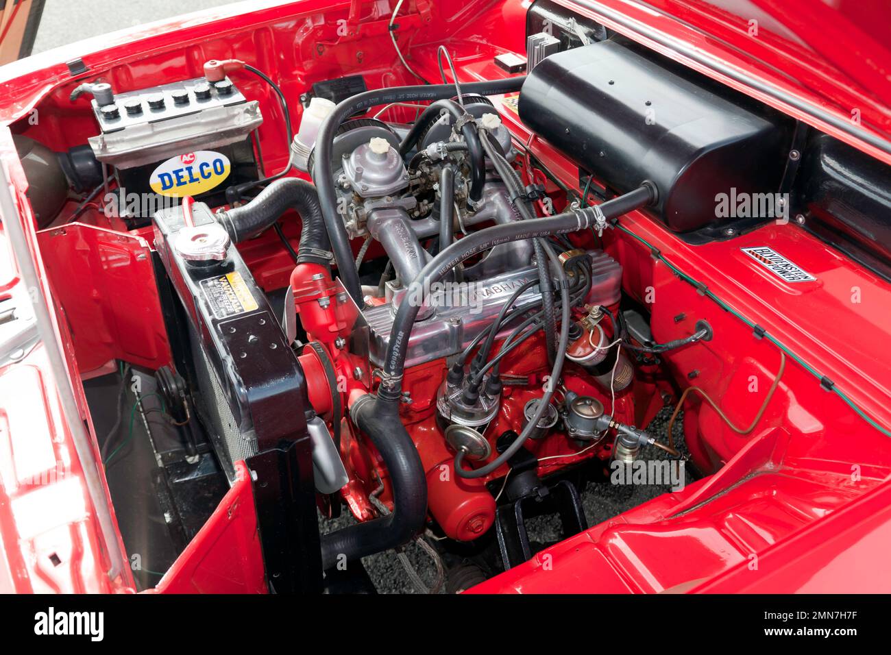 View of  the engine Bay of a a Red, 1966, Vauxhall Viva HB  Deluxe 90 Brabham, on display at the 2022 Silverstone Classic Stock Photo