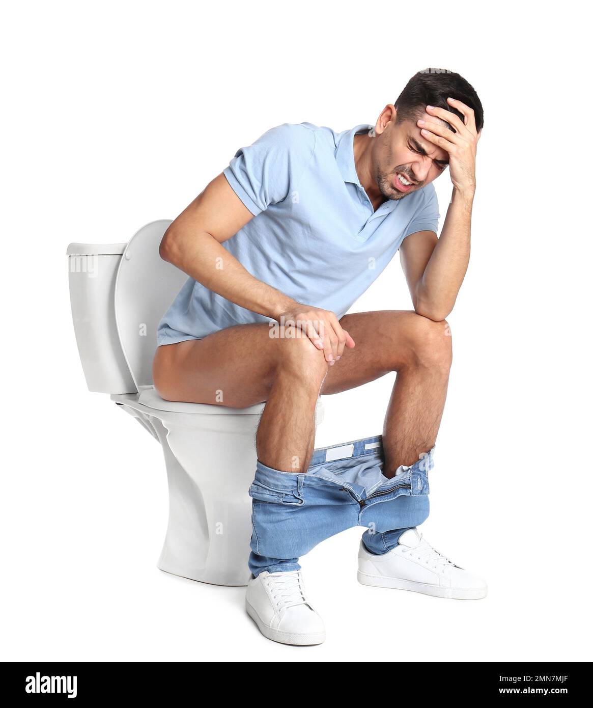 Man suffering from diarrhea on toilet bowl, white background Stock ...