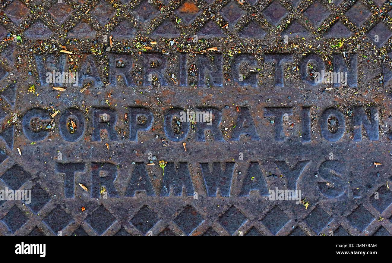 A cast iron grid, embossed with Warrington Corporation Tramways. Stockton Heath, South Warrington , Cheshire, England, UK, WA4 6HN Stock Photo
