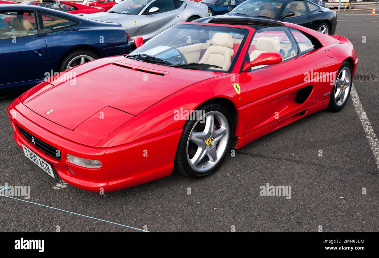 Three-quarters Front View of a Red, 1999, Ferrari 355  GTS F1, on display at the 2022 Silverstone Classic Stock Photo