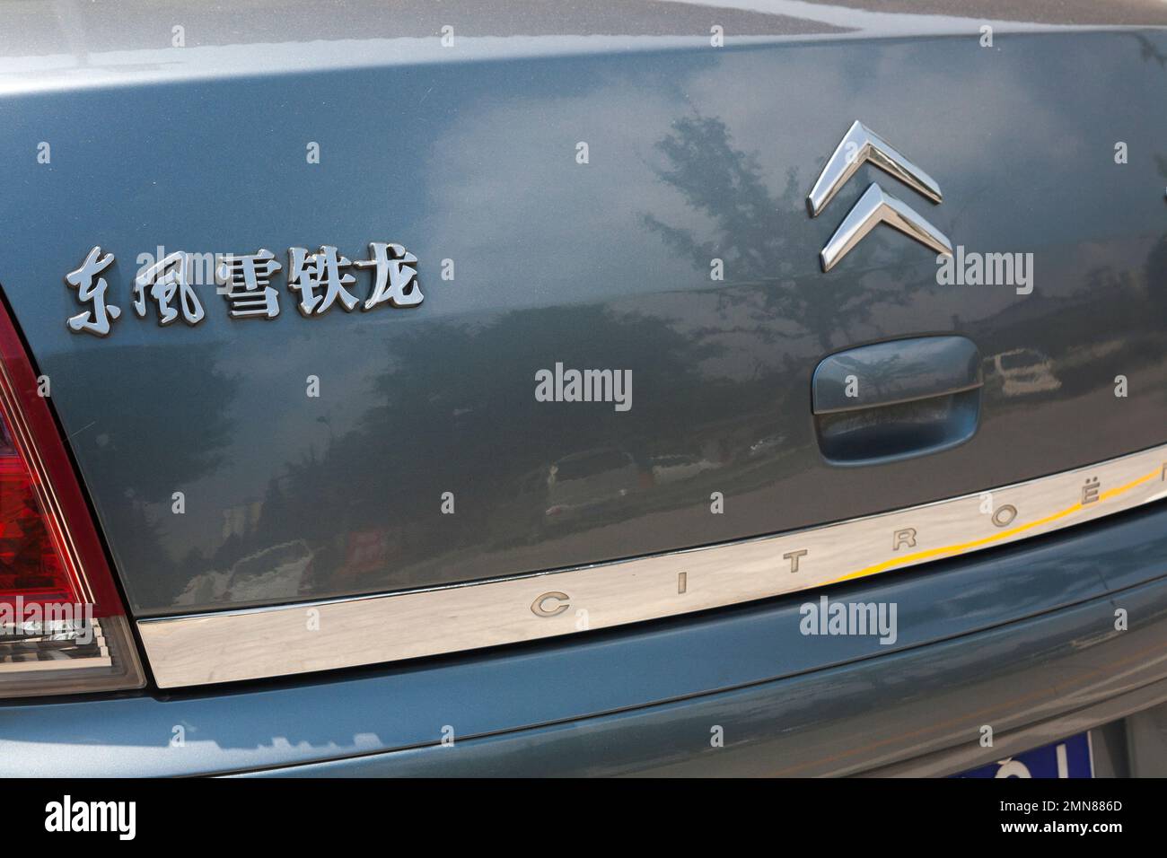 Rear with numberplate and model written in Chinese characters / writing Citroen car / vehicle in China.  Xian, China. (125) Stock Photo