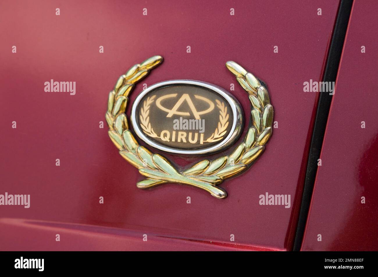 Qirui company badge logo on Qirui car / vehicle in China. Xian, PRC. (125) Stock Photo