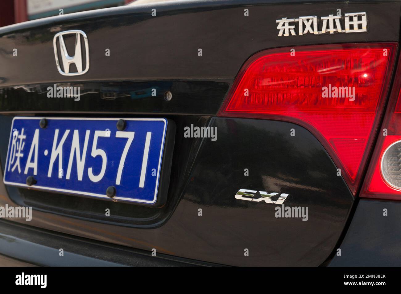 Rear with numberplate and model written in Chinese characters / writing Honda car / vehicle in China.  Xian, China. (125) Stock Photo