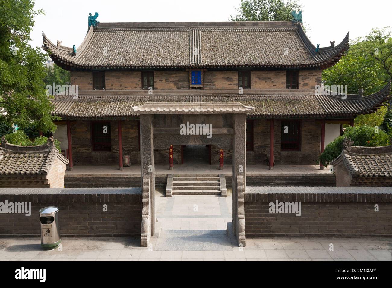 Chinese pagoda style hall building with rising roof eaves, situated in the grounds Jianfu temple, close to the Small Wild Goose Pagoda AKA Little Wild Goose Pagoda, Xi'an, PRC, China. (125) Stock Photo