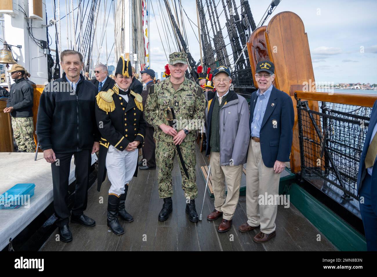 BOSTON (Sept. 30, 2022) Chief Gas Turbine Systems Technician (Mechanical) Adam Yenny poses with current and former Navy leadership after receiving the 2021 USS Constitution George Sirian Meritorious Leadership Award while underway aboard USS Constitution. The USS Constitution George Sirian Meritorious Leadership Award recognizes a chief petty officer who embodies former USS Constitution crew member George Sirian through their technical expertise, dedication, and leadership. USS Constitution, is the world’s oldest commissioned warship afloat, and played a crucial role in the Barbary Wars and th Stock Photo