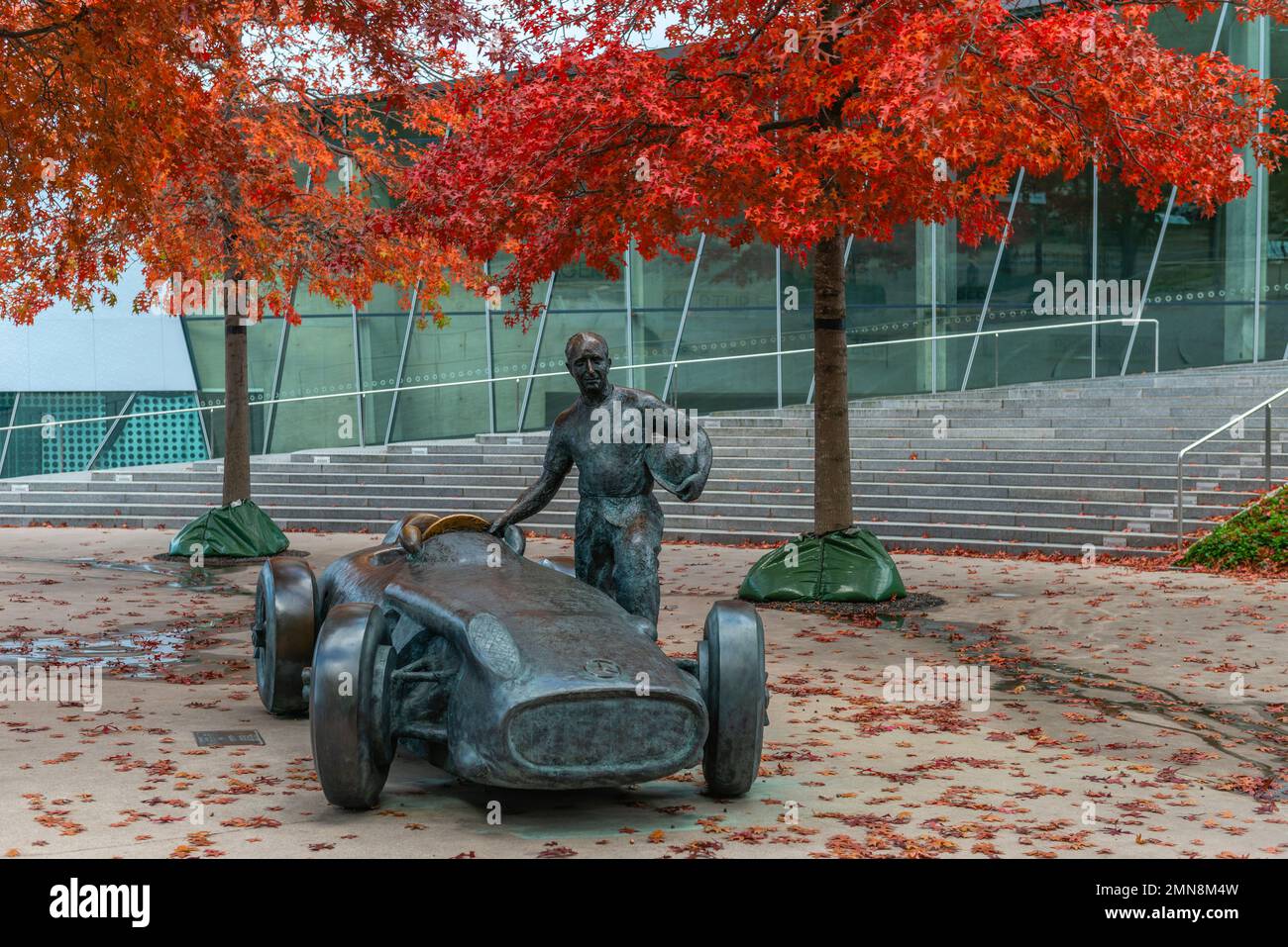 Sculpture of Juan Manuel Fangio, Five times world champion with 'Silberpfeil',  Mercedes-Benz Werk Untertürkheim, Benzviertel, Stuttgart,  Germany Stock Photo