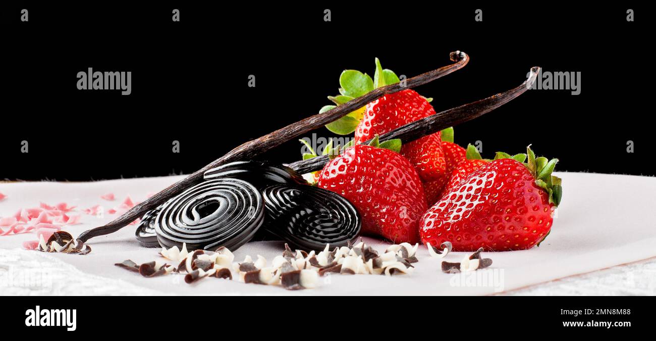 strawberries, liquorice, vanilla buds and shaved chocolate Stock Photo