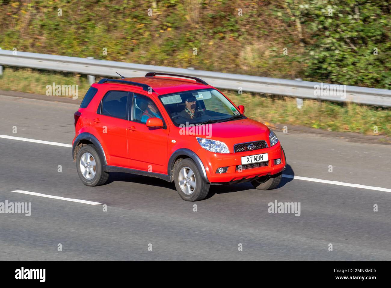 2008 Red DAIHATSU TERIOS 1495cc Petrol 5 speed manual a mini SUV produced by the Japanese automobile manufacturer Daihatsu since 1997 as the successor to the F300 series Rocky; Stock Photo