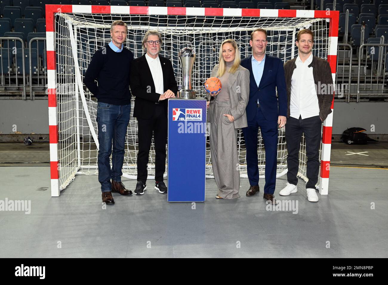 Cologne, Germany. 30th Jan, 2023. Sports ambassadors Torsten May, l-r, Toni Schumacher, Janine Kunze, LanxessArena boss Stefan Löcher and Moritz Müller stand in the handball goal at the press conference and presentation of the highlights in Cologne's sports year 2023. Credit: Horst Galuschka/dpa/Horst Galuschka dpa/Alamy Live News Stock Photo