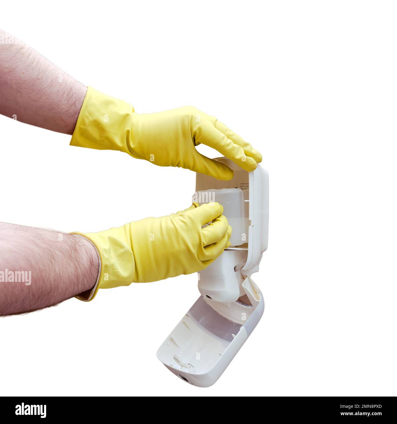 Replacing soap in a dispenser on the wall of a public toilet, isolated