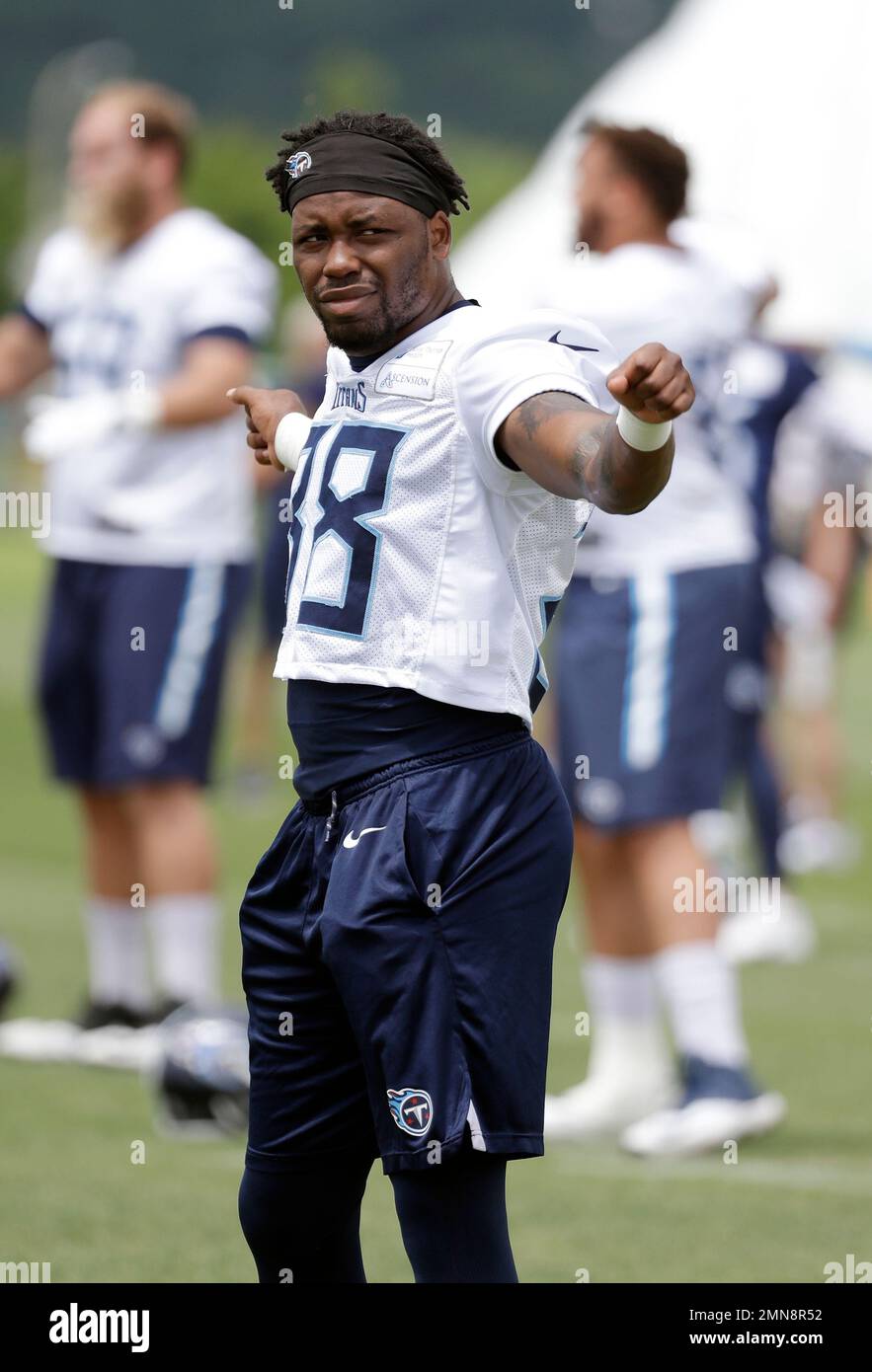 Tennessee Titans running back Akrum Wadley warms up during an organized