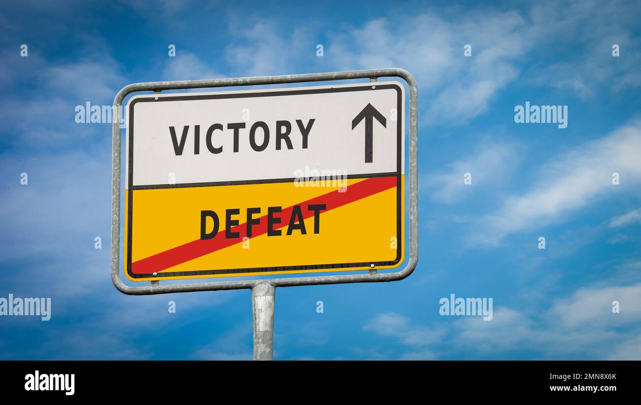 Street Sign the Direction Way to Victory versus Defeat Stock Photo Alamy