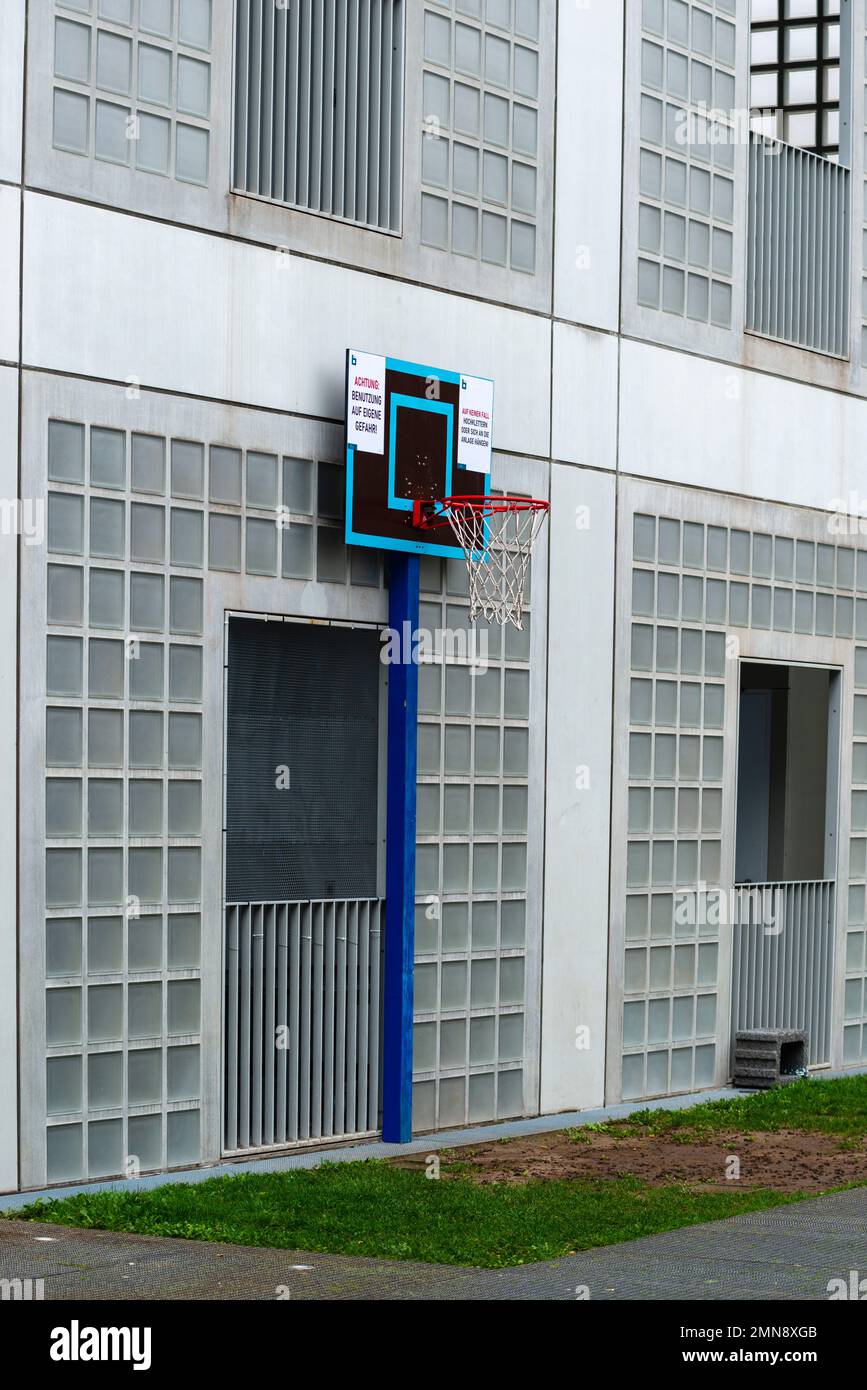 Nobody playing basketball at the lonely basketball hoop at the city Library, Europa Viertel or European Quarter, Stuttgart, Germany, Europe Stock Photo