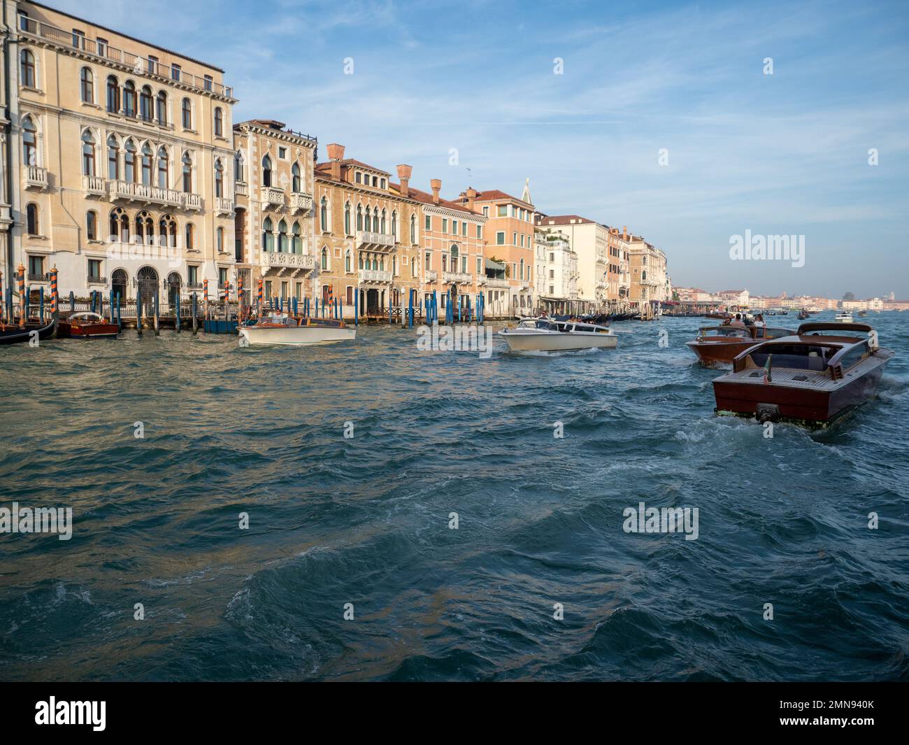 Boats sailing in Venice, Italy. Tourism and transportation concept. Stock Photo