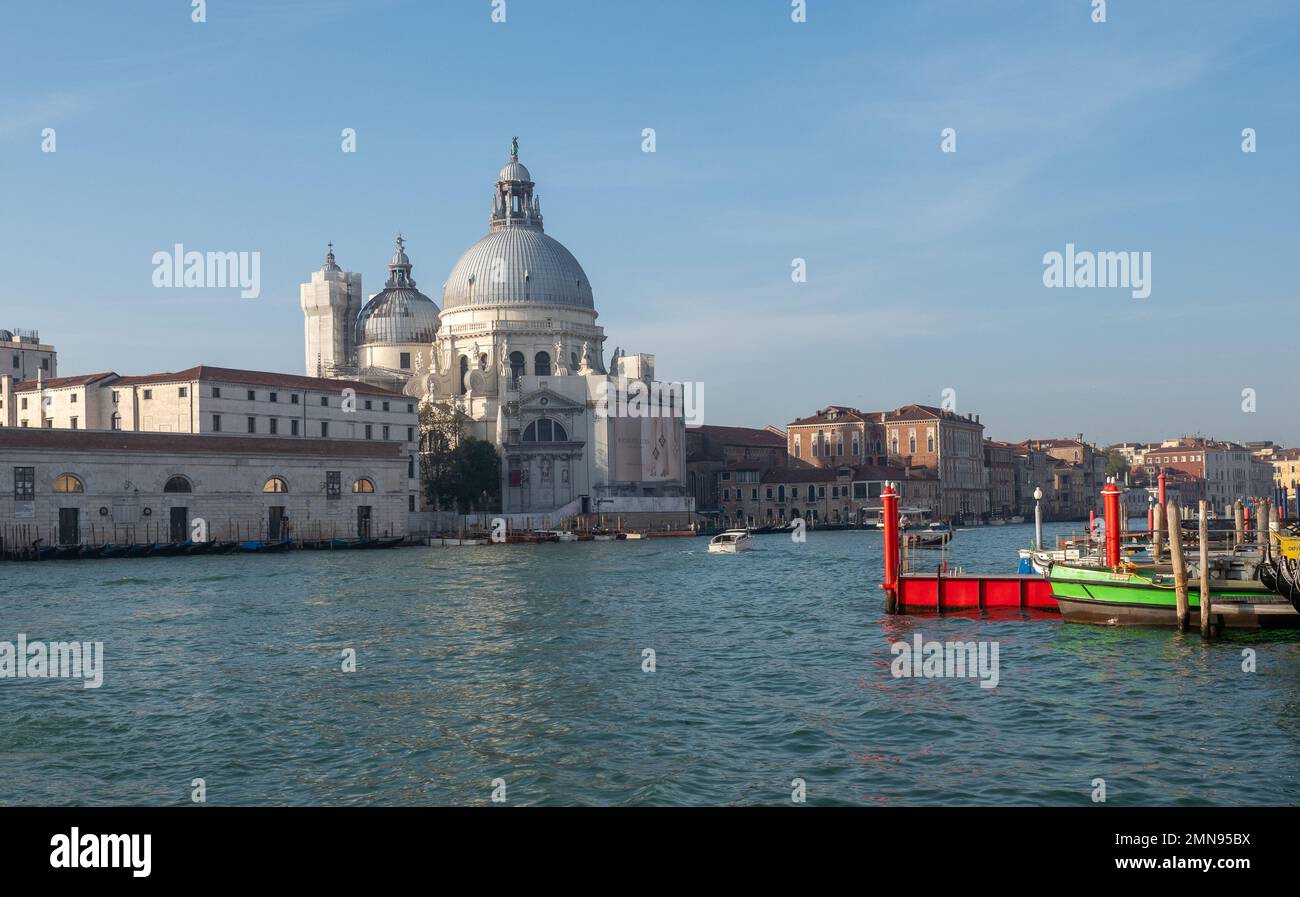 View of the basilica Santa Maria della Salute in the grand canal in Venice. Tourism concept. Stock Photo