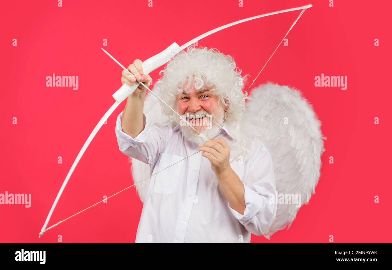 Valentines day cupid. Angel man in white wings with bow and arrows. Love concept. Stock Photo