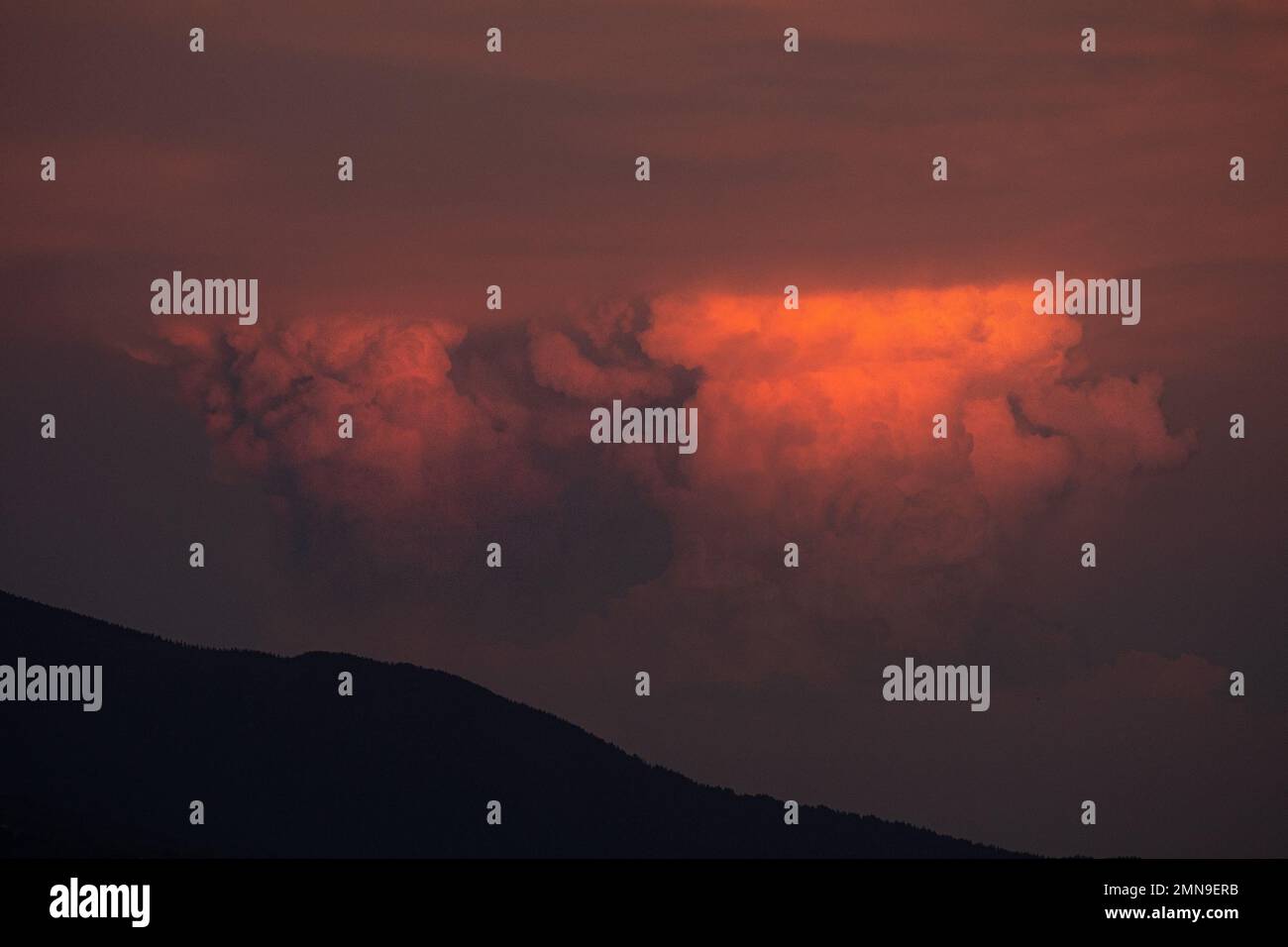 View of the sky with cumulonimbus clouds at sunset Stock Photo