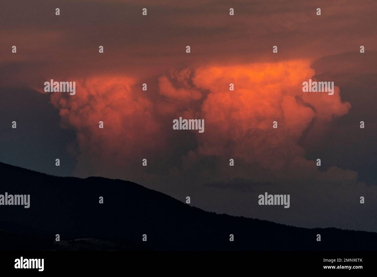 View of the sky with cumulonimbus clouds at sunset Stock Photo