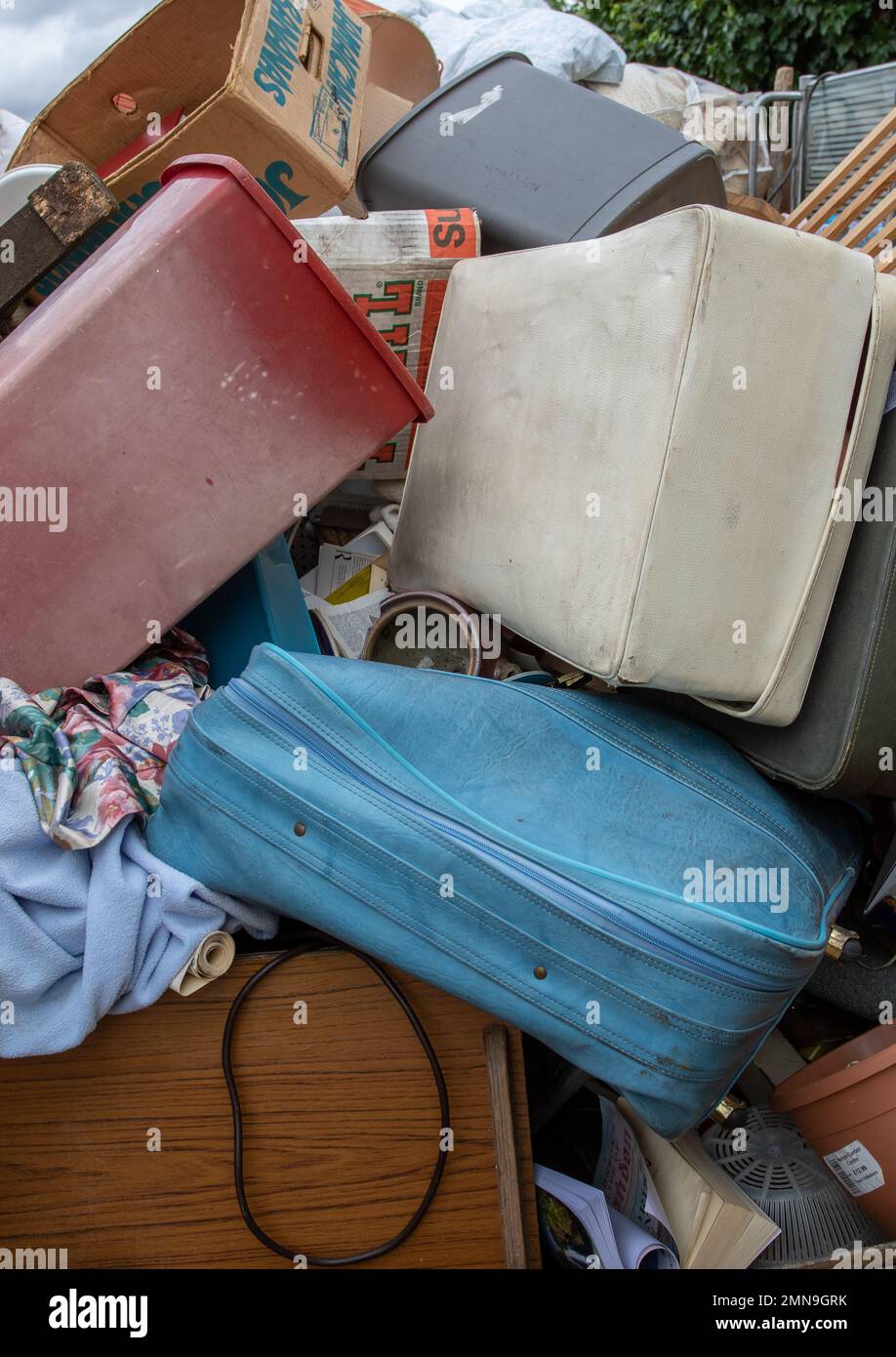 Personal effects from a house clearance casually thrown away in a